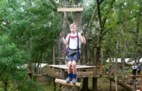 Boy On Forest Run Course