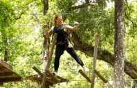 Woman on Mountain Trail Course